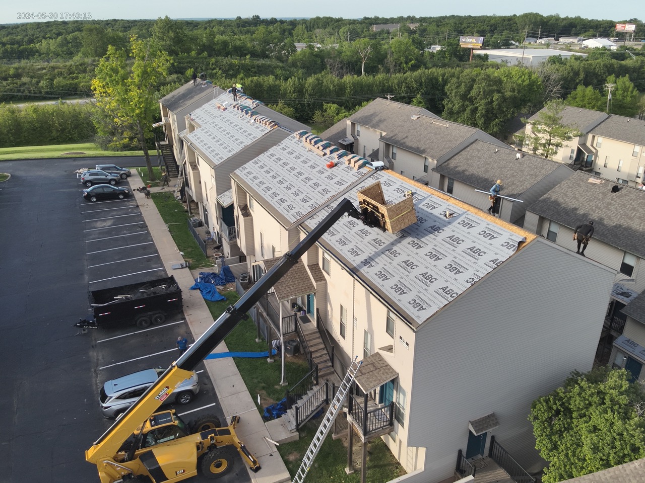 Shingle roof installation on a multi family building
