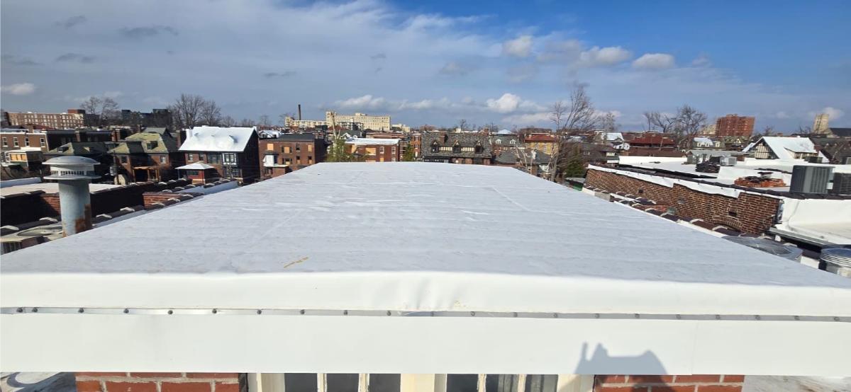 Aerial of a completed Amigo TPO single-ply roof installation